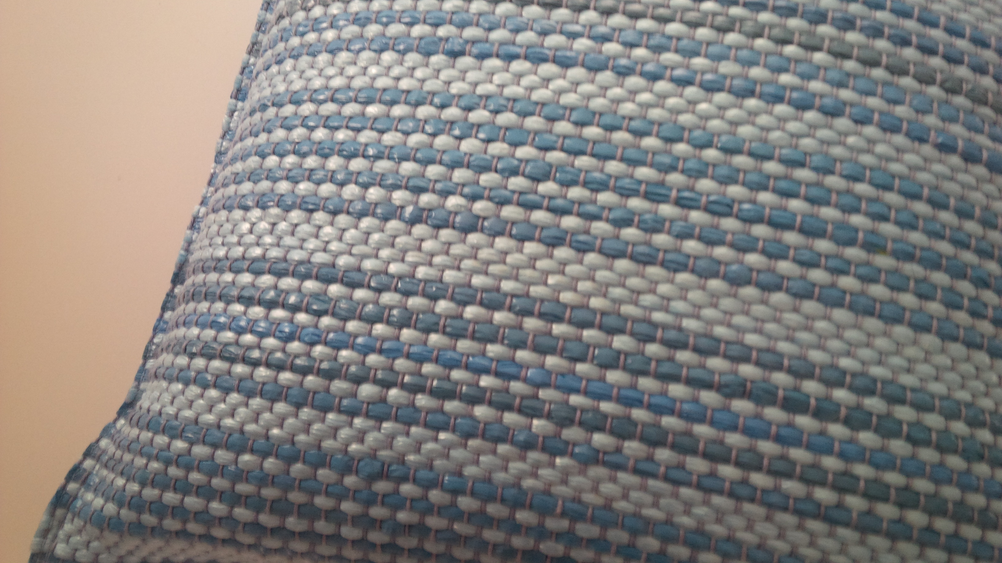 Gray pillow with blue stripes